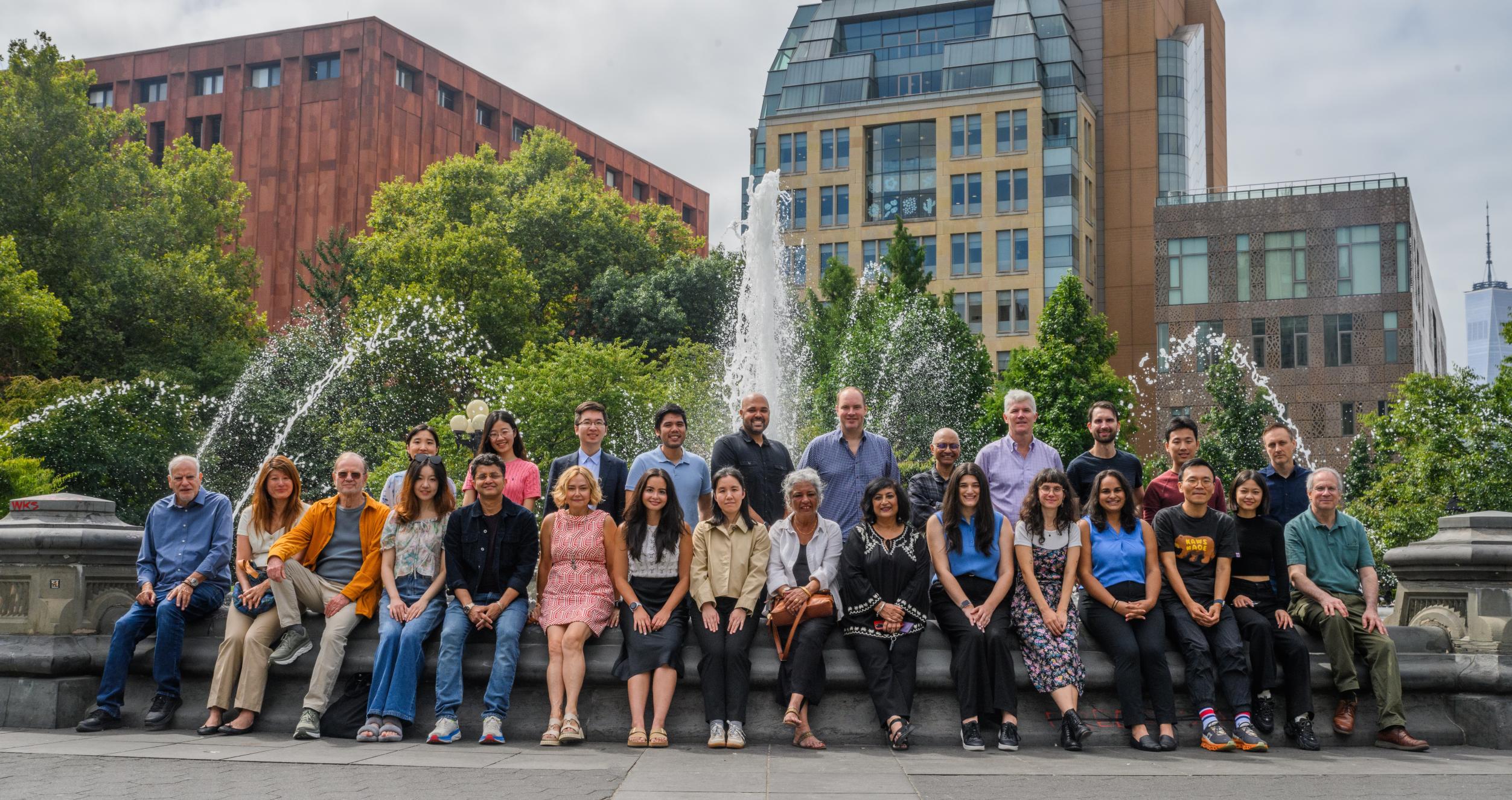 Group photo of Stern Marketing Department in front of Washington Square Park fountain